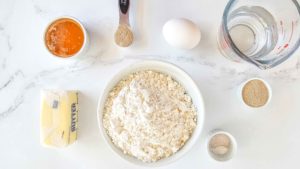 Ingredients in gluten-free crescent rolls: gf flour, salt, baking powder, yeast, psyllium husk powder, egg, honey, butter, water