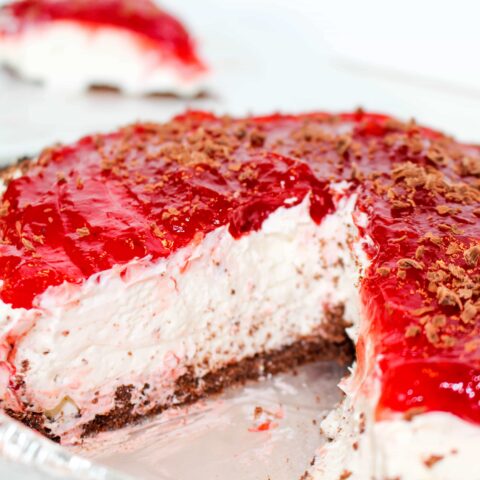 Gluten Free Black Bottom Cheesecake: A sinfully decadent dessert that is simple to make (no-bake!) and features layers of crisp chocolate, tangy cheesecake, and a sweet berry topping of your choosing.