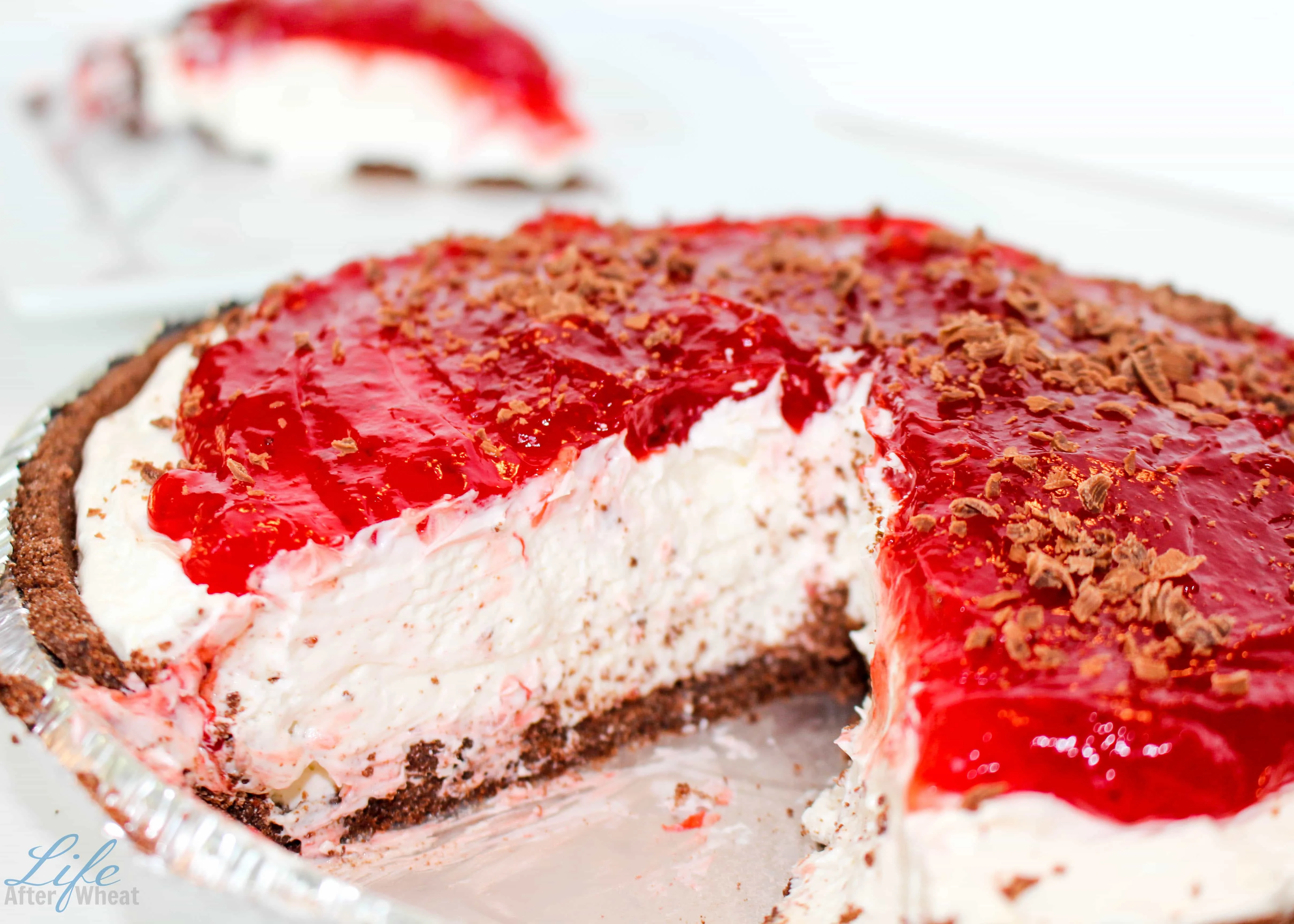 Gluten Free Black Bottom Cheesecake: A sinfully decadent dessert that is simple to make (no-bake!) and features layers of crisp chocolate, tangy cheesecake, and a sweet berry topping of your choosing.