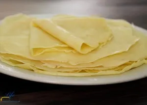 Quick and easy gluten free crepes are a cinch to make! Whip a few simple ingredients in your blender, pour into a skillet, cook, flip, and repeat. They're fold-able, roll-able, and perfect with any filling!