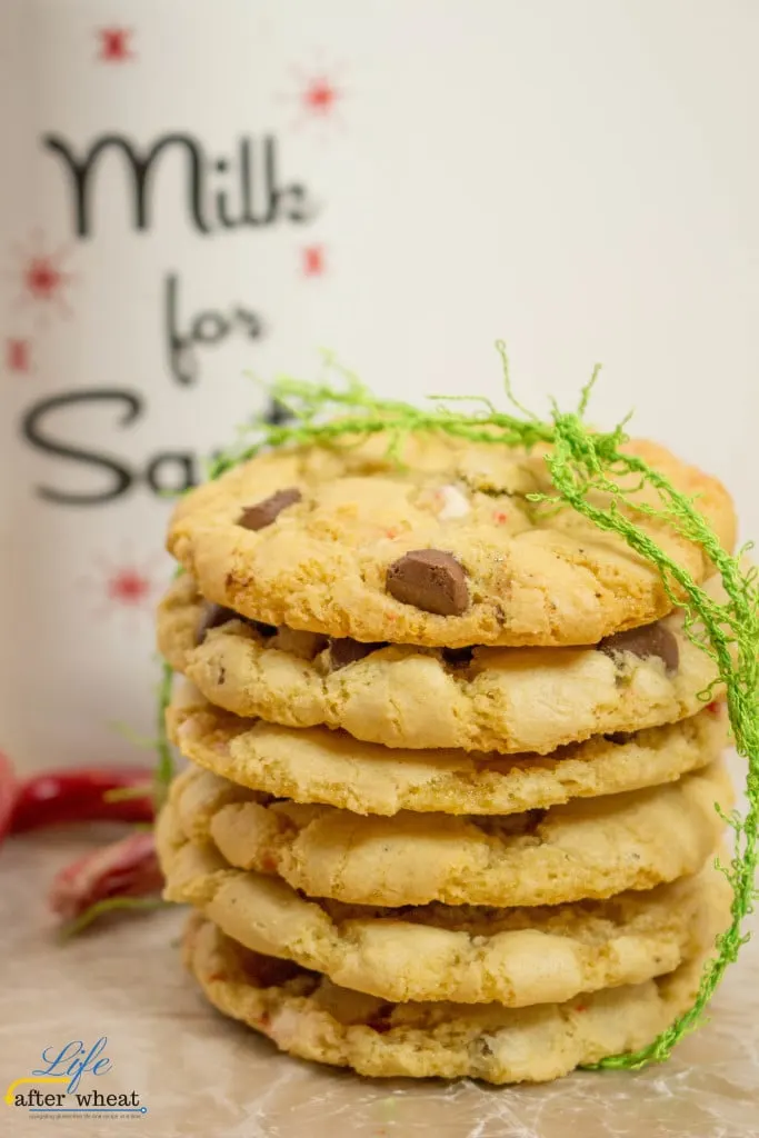 Shhhh! This recipe is straight from the Elves at Santa's Workshop. They know that Santa loves warm cookies that are soft and chewy in the middle with crispy edges. And of course adding crushed candy canes is the perfect touch for that Jolly Fellow. I can guarantee that the kiddos won't complain either! But even Santa doesn't know what secret ingredient makes these cookies over-the-top delicious. 