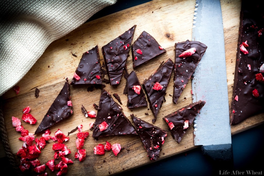 The elegance of chocolate dipped strawberries in an easy-to-make chocolate bark! Creamy melted chocolate is studded with crisp freeze dried strawberries and topped with Himalayan sea salt. It's a beautiful treat that is perfect for any occasion or holiday! Dairy free option.