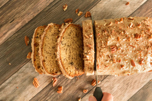This is no ordinary banana bread! The flavors of browned butter, sweet bananas, a tantalizing maple glaze and toasted pecans come together to make the best banana bread you've ever tasted.