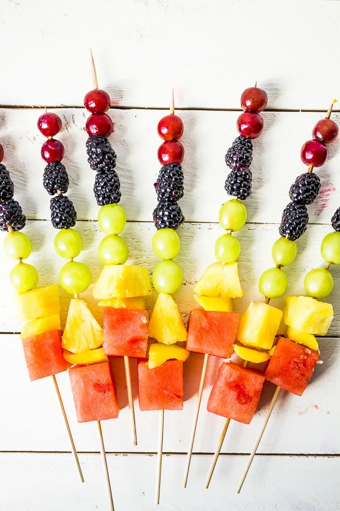 Kids will love assembling these DIY fruit kabobs! Use any fruit to make them for any holiday or event!