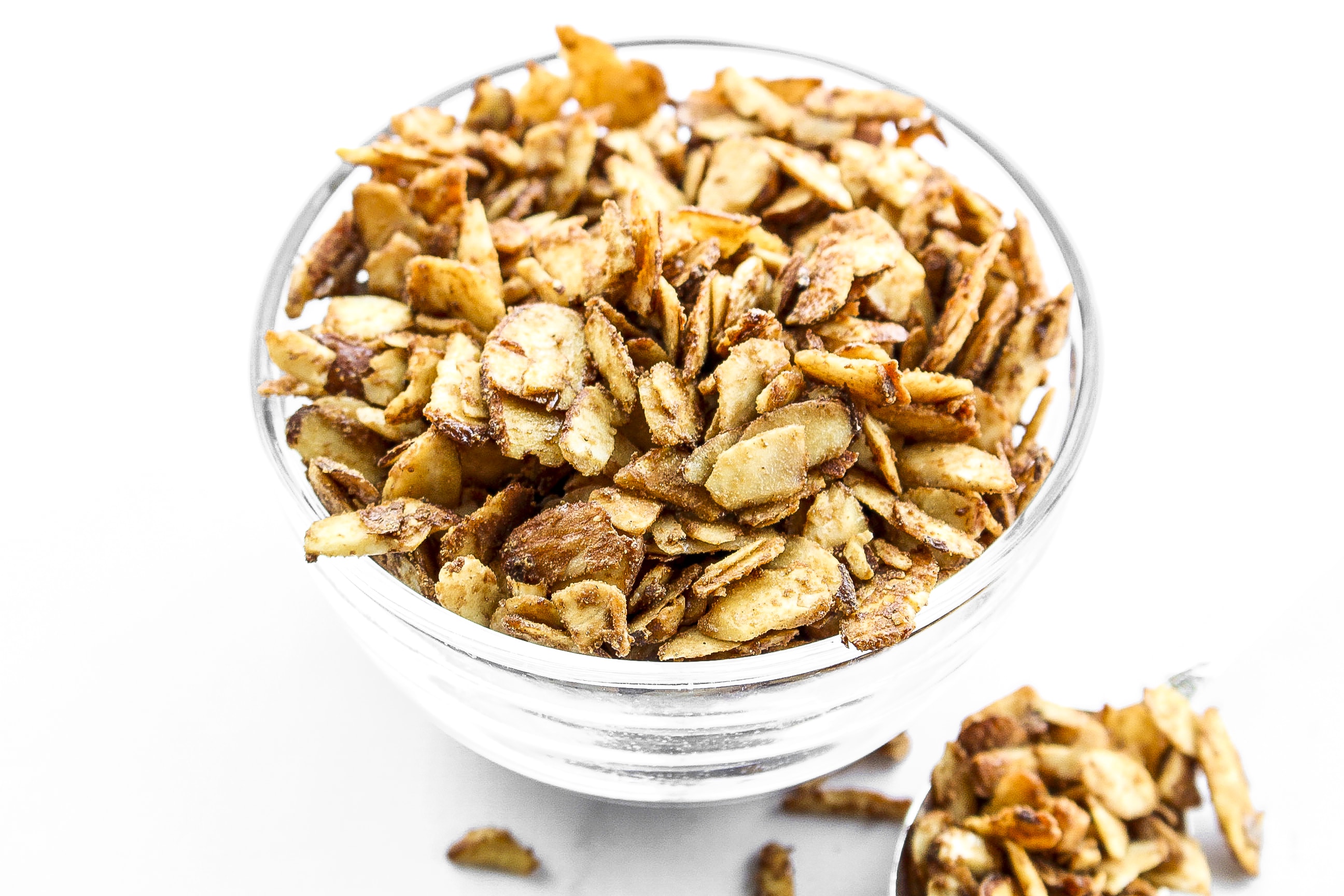 Cardamom Spiced Almonds add a show-stopping finish to many a dish, and are also great by the handful! Sweetened with coconut sugar, they're also a healthy snack. Top salads, coconut rice, and more.