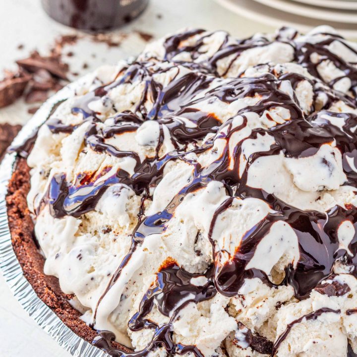 chocolate chip ice cream pie drizzled with hot fudge sauce