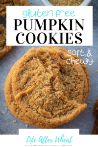 A Pinterest-friendly image with the words: Gluten Free Pumpkin Cookies, soft and chewy. A stack of pumpkin cookies with half a cookie on top and crumbs surrounding it. Cookies are on a dark blue and white marbled backdrop and everything is sprinkled with coarse sugar.