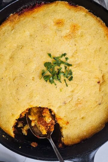 gluten free tamale pie in a cast iron skillet