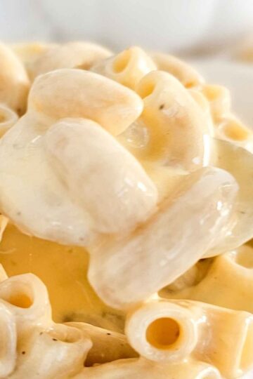 creamy mac and cheese in a white bowl