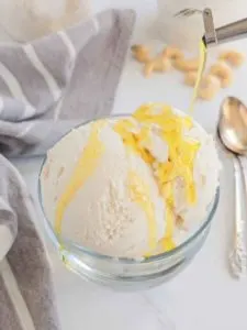 drizzling olive oil on dairy free vanilla ice cream