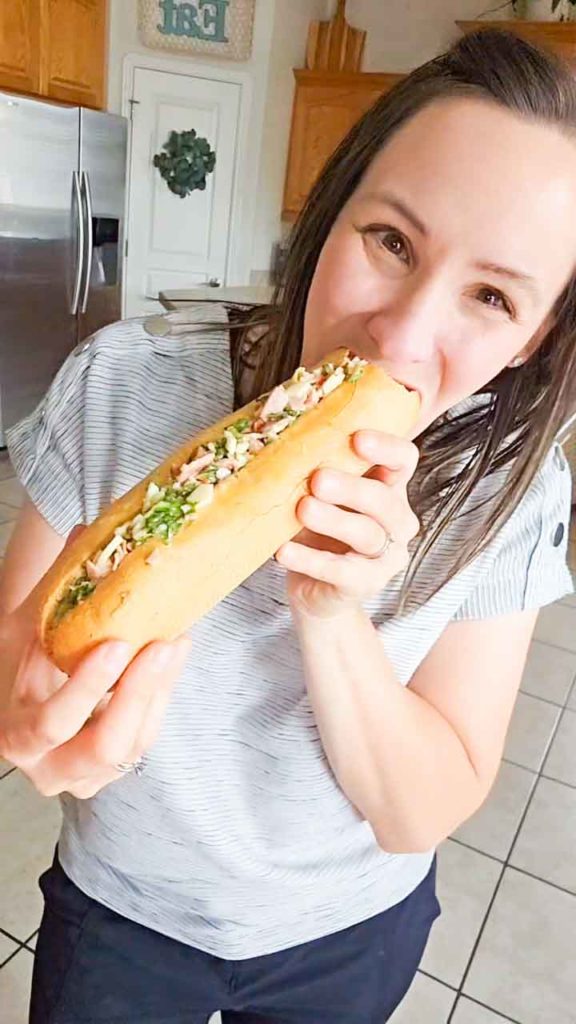 woman eating a sandwich