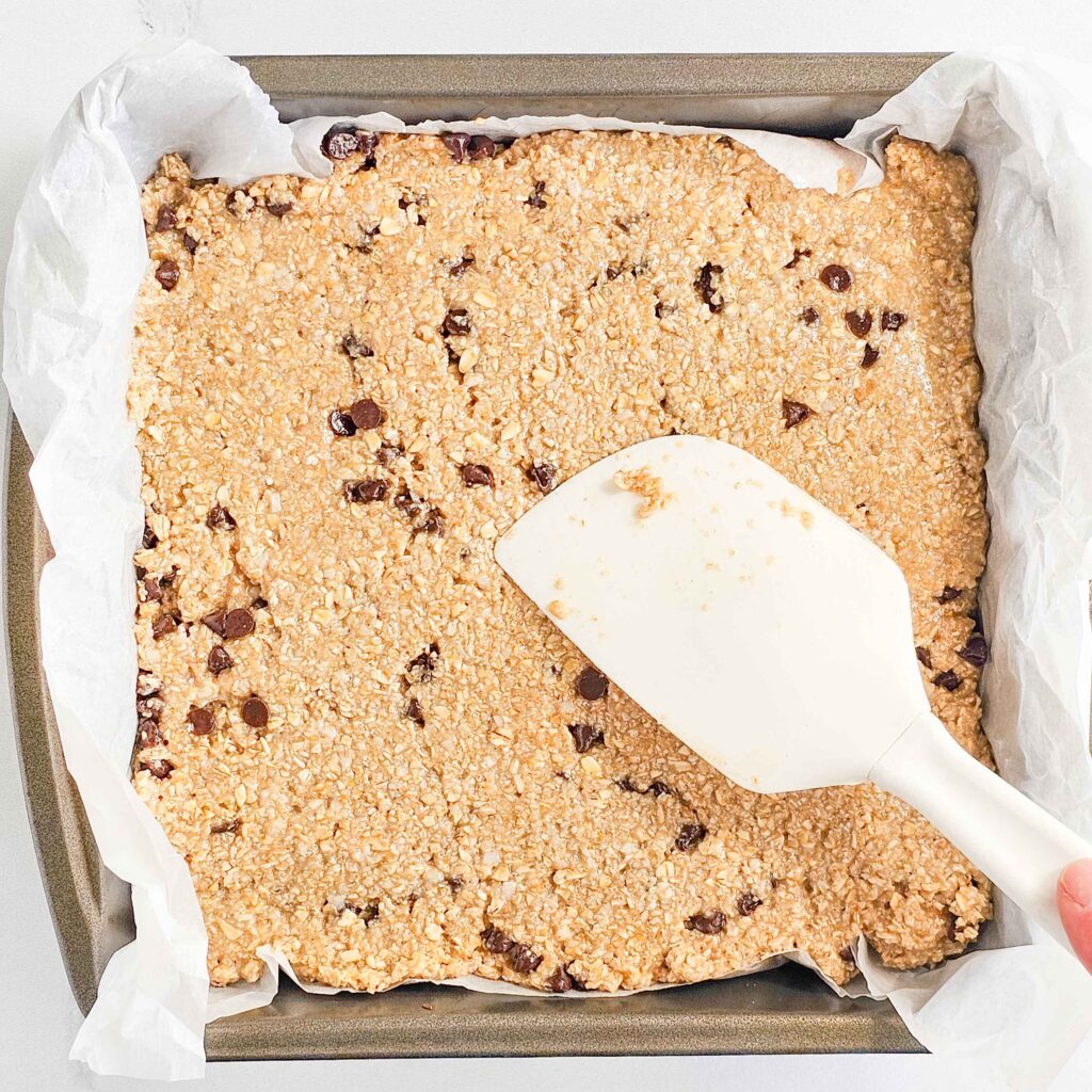 chocolate chip dough spread into a square pan